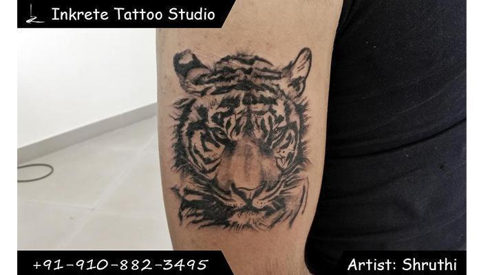 A realistic tiger tattoo at Inkrete Tattoo Studio | Inkrete Tattoo Studio