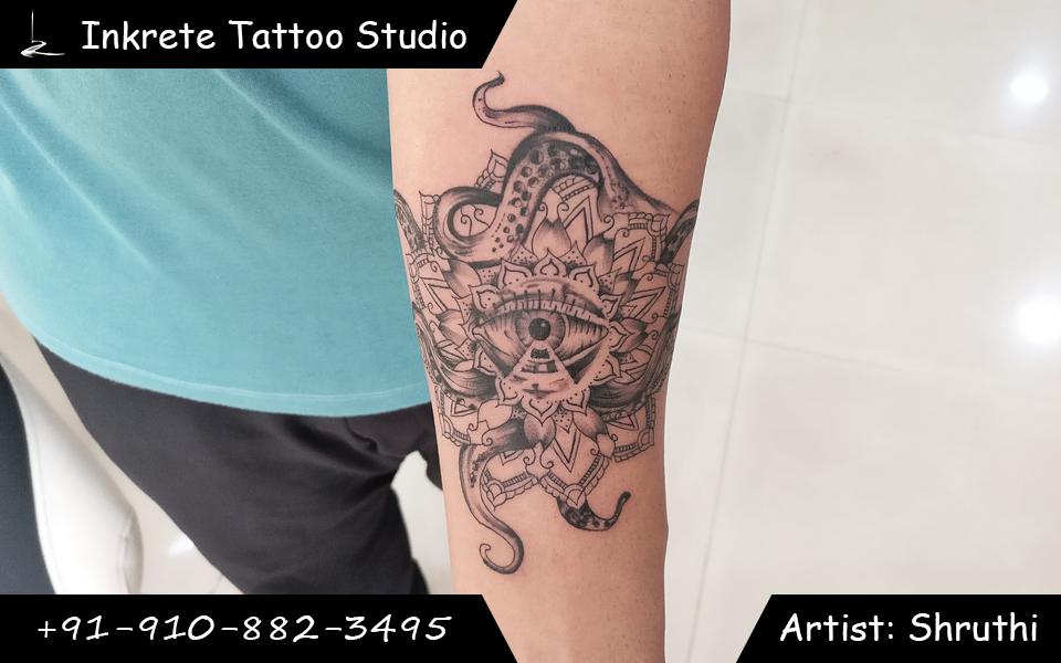 Octopus mandala tattoo, third eye tattoo