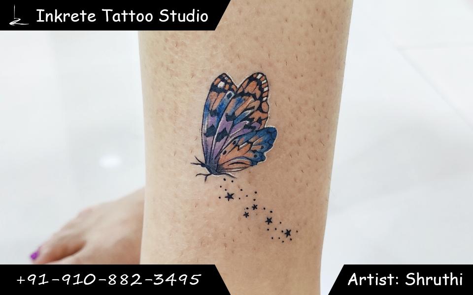 butterfly tattoo, colour tattoo, leg tattoo, minimal tattoo