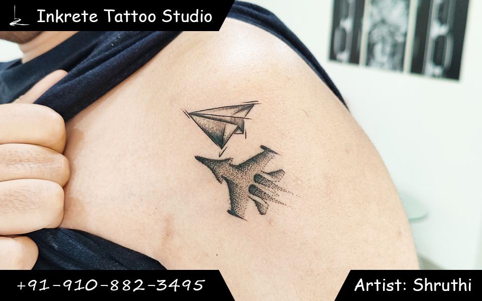 dotwork tattoo, fighter jet tattoo, paper plane tattoo, minimal tattoo