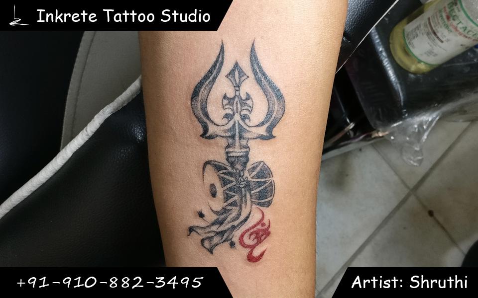 Thrishul tattoo, Damru tattoo, om tattoo, religious tattoo, trident tattoo