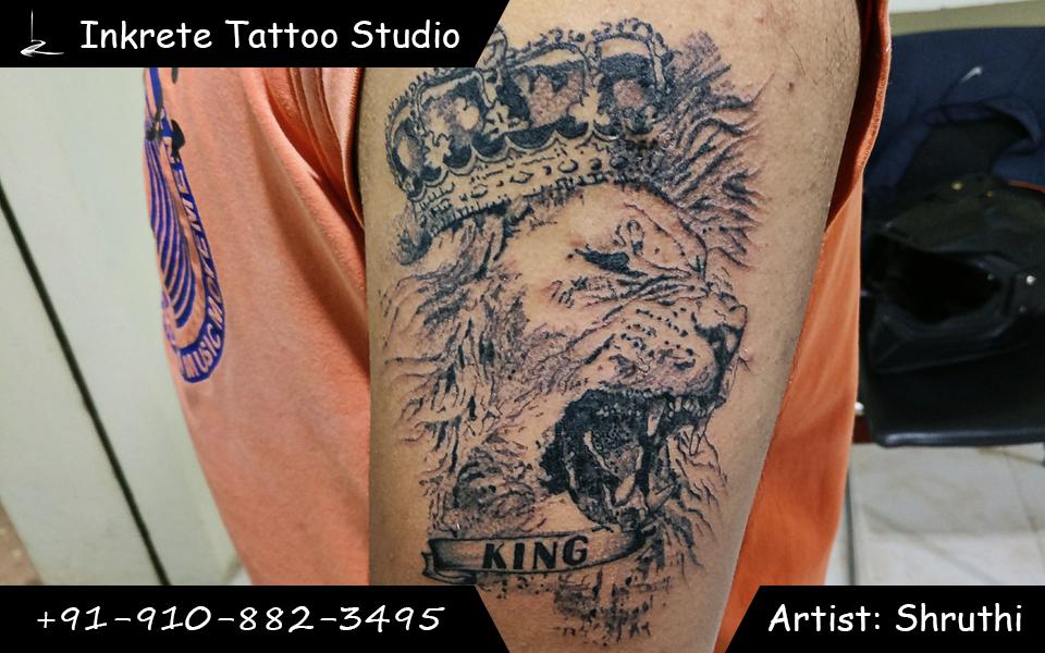 Lion tattoo, half arm tattoo, upper am tattoo, crown tattoo