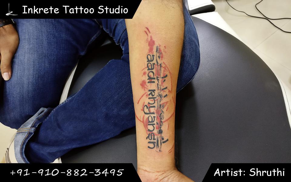 Abstract font tattoo, forearm tattoo, calligraphy tattoo, color tattoo