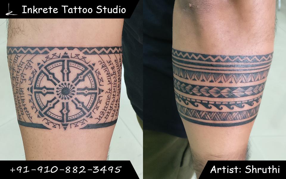 dharma wheel,wheel tattoo,sanskrit,sanskrit verse,sanskrit tattoo,devanagiri calligraphy,armband tattoo,arm band,forearm tattoo,tattoo idea,inkrete tattoo,black tattoos