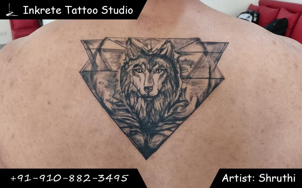 Abstract wolf tattoo, back tattoo ideas, geometric wolf tattoo