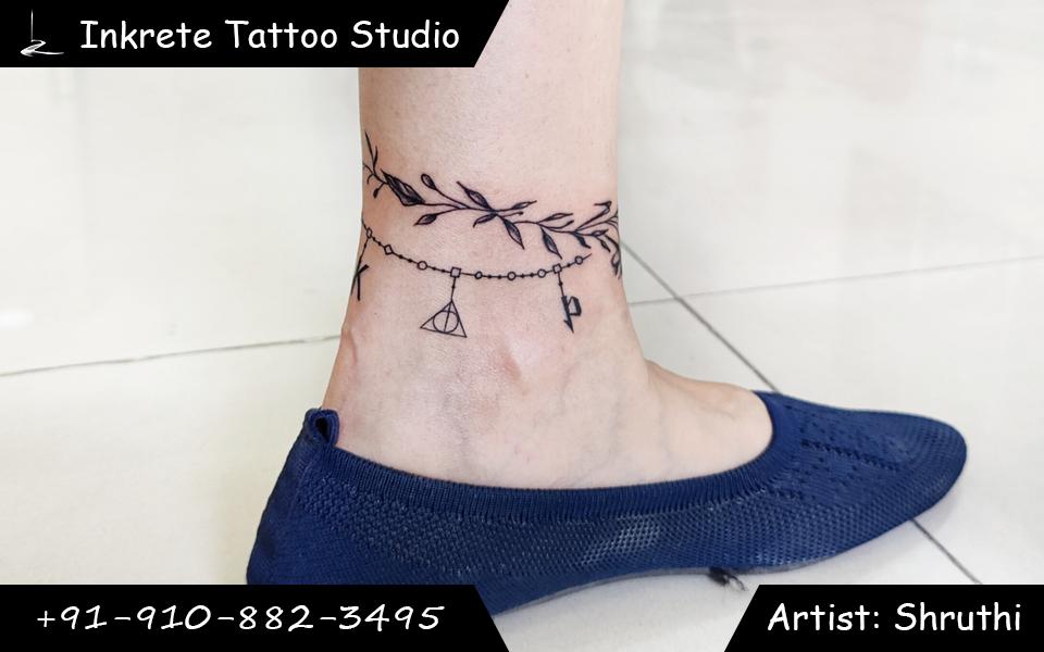 ankle tattoo, anklet tattoo, floral tattoo