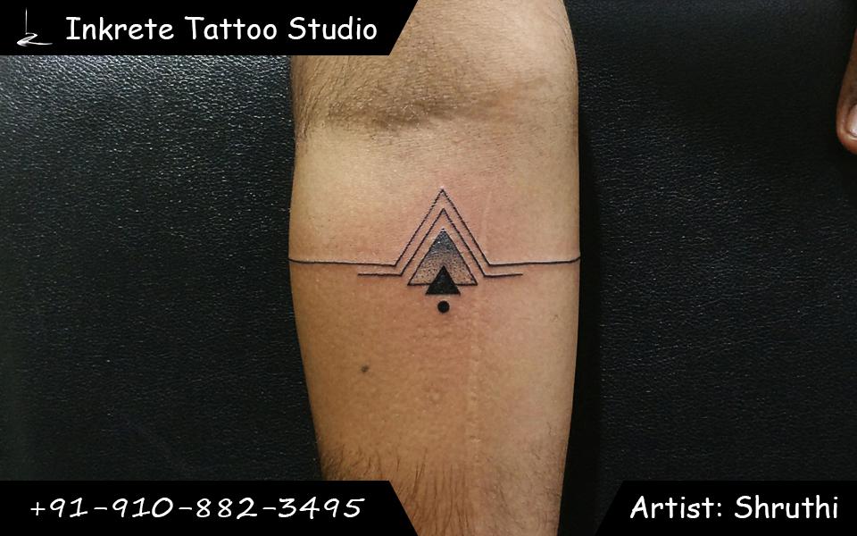 Geometric tattoo, minimal arm band tattoo